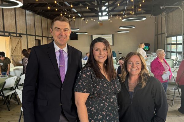 Russell Cook, Katie Charleson, and Reisa Nolte at the Family Respite Care Brunch Banquet on October 11, 2025.